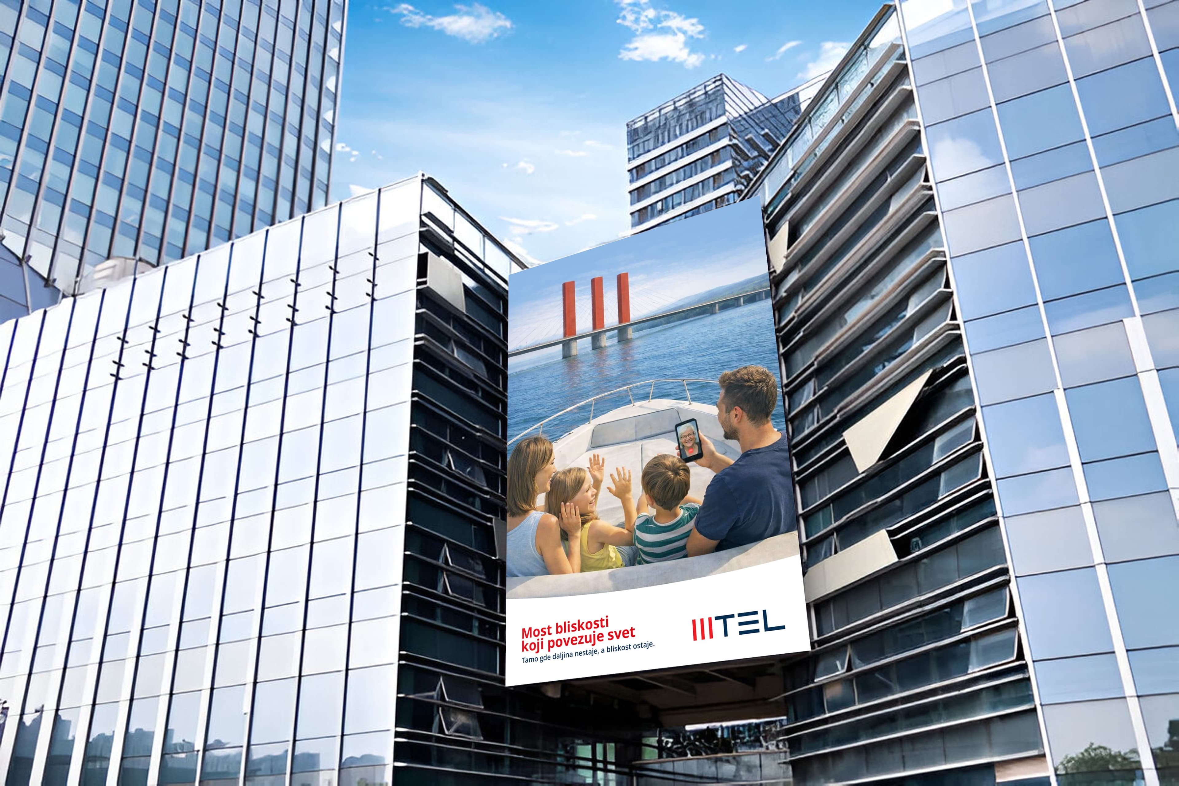 Billboard mockup on a glass building facade